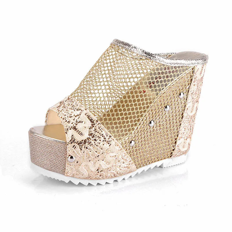 Women's black platform sandals with a lace-up ankle strap and hollowed-out chunky heel.