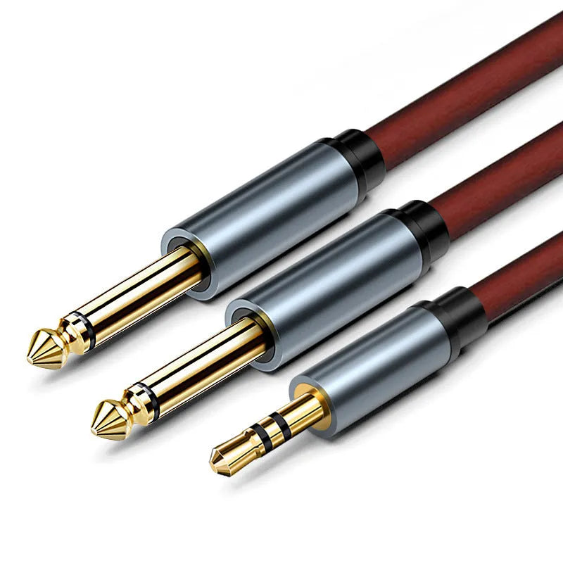 3.5mm to 6.5mm male-to-male audio cable with gold-plated connectors on a black background.