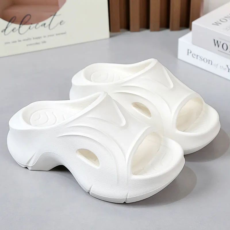 Women's thick-soled round-toe EVA slippers in rose red colour on a white background.