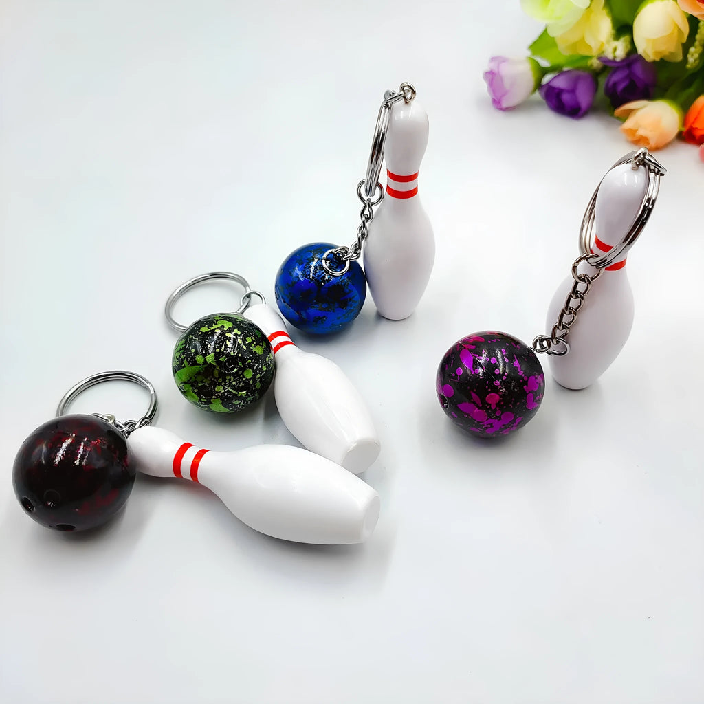 Mini bowling pin simulation keychain pendant in blue colour with metal keyring attachment