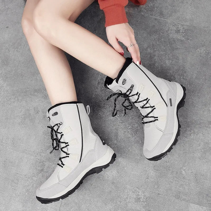 Women's mid-calf thermal snow boots in genuine leather with round toe and non-slip rubber sole