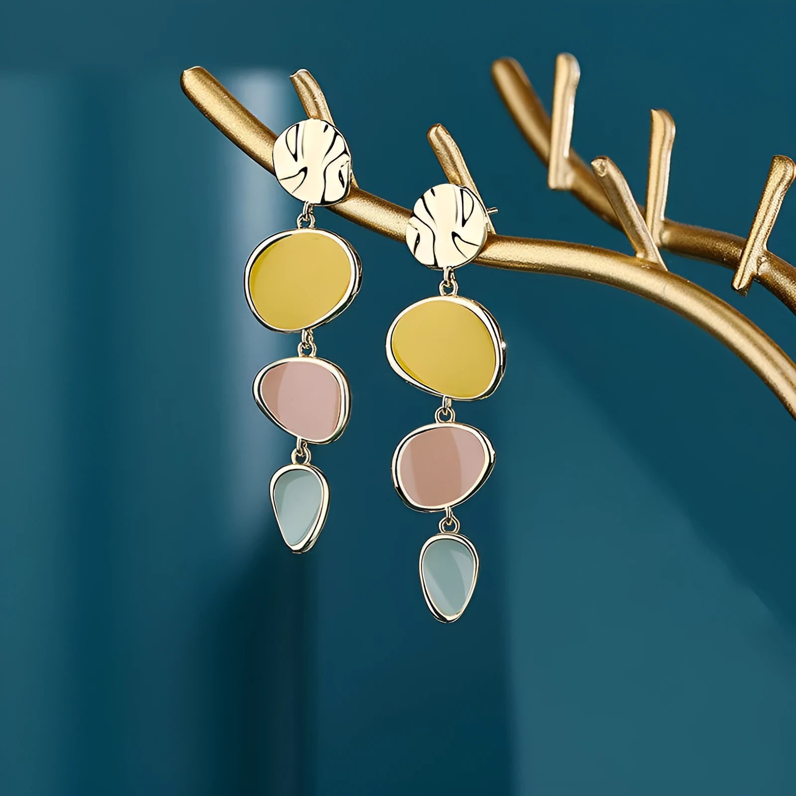 Morandi three-colour oil-dripping disc earrings with sterling silver needle on white background