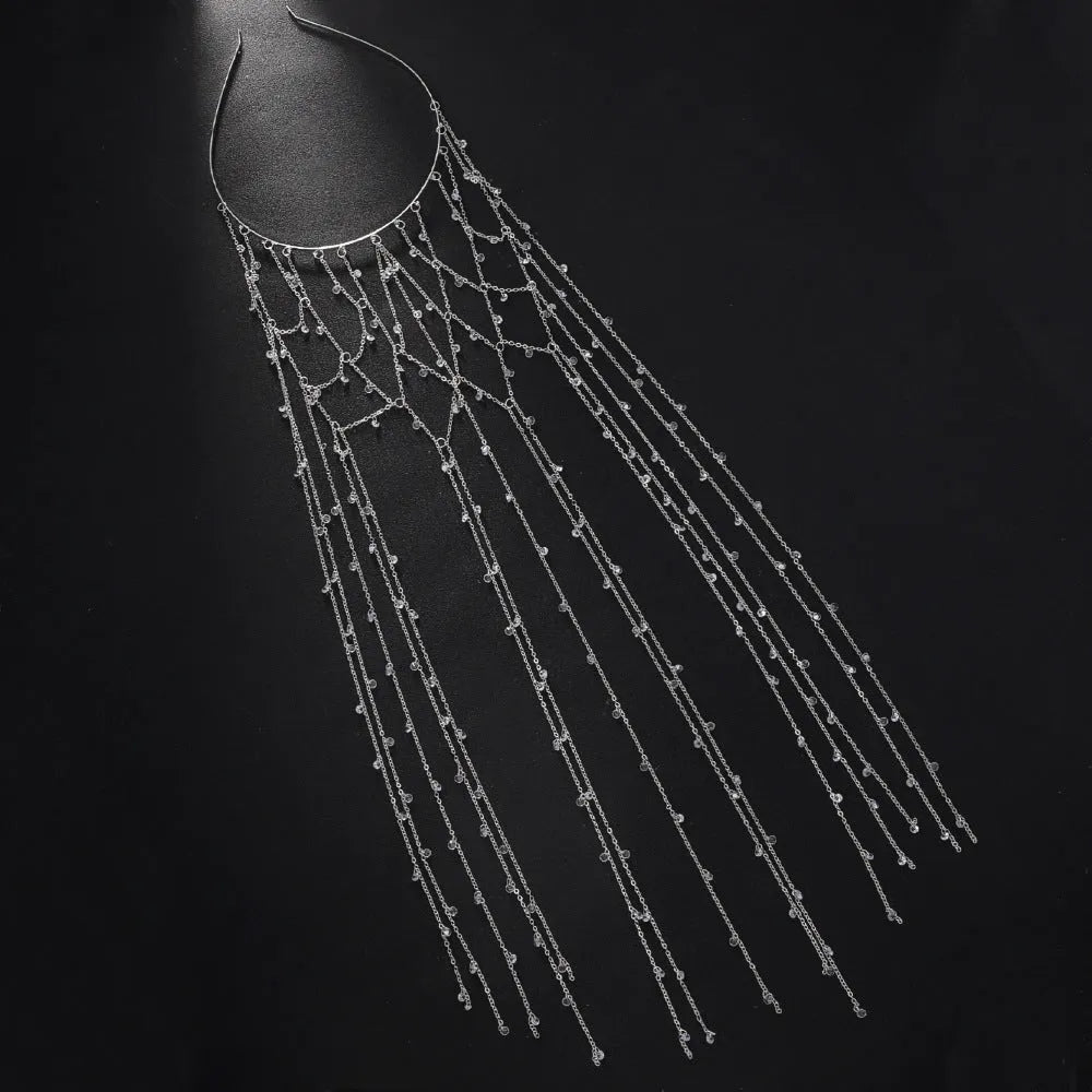 Gold and silver rhinestone mesh hair band with a tassel detail