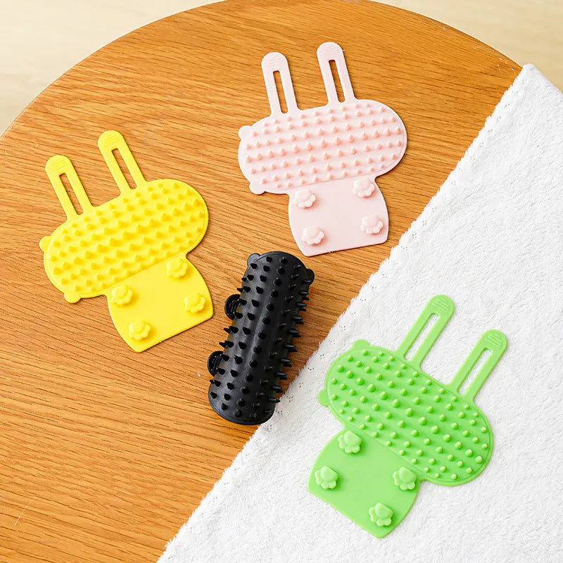 Silicone pet grooming brush with comb teeth and adjustable strap in black, green, pink or yellow