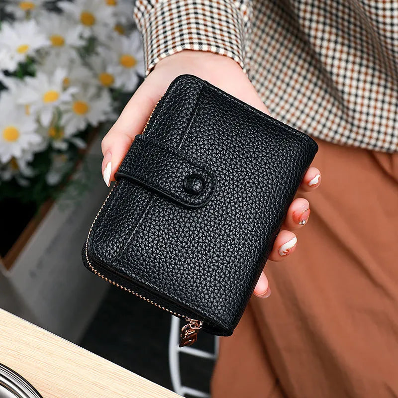 Women's short organ wallet with lychee pattern lining in beige, pink, black and red colours