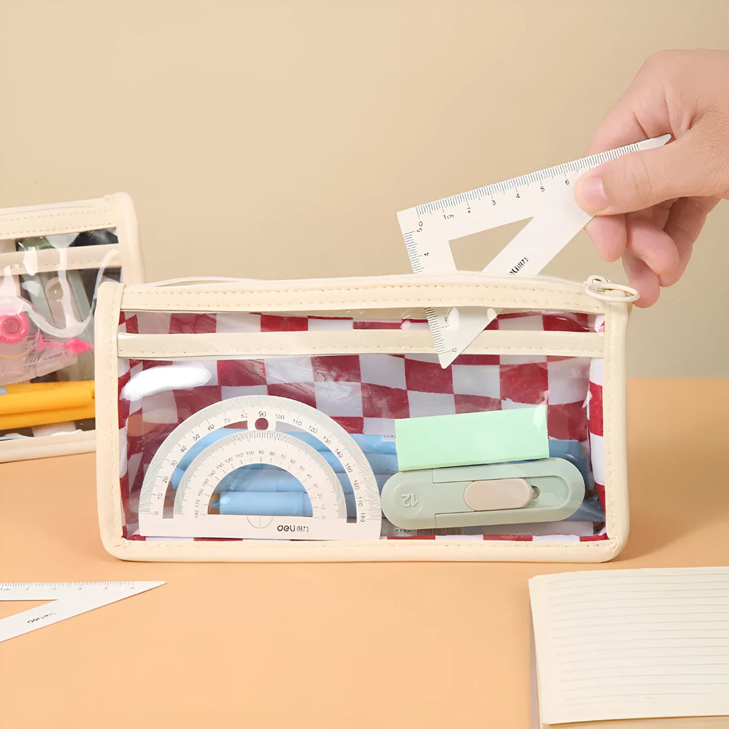 Transparent PVC pencil case with chessboard pattern showing pens inside, dimensions 21.5x8x11.5cm