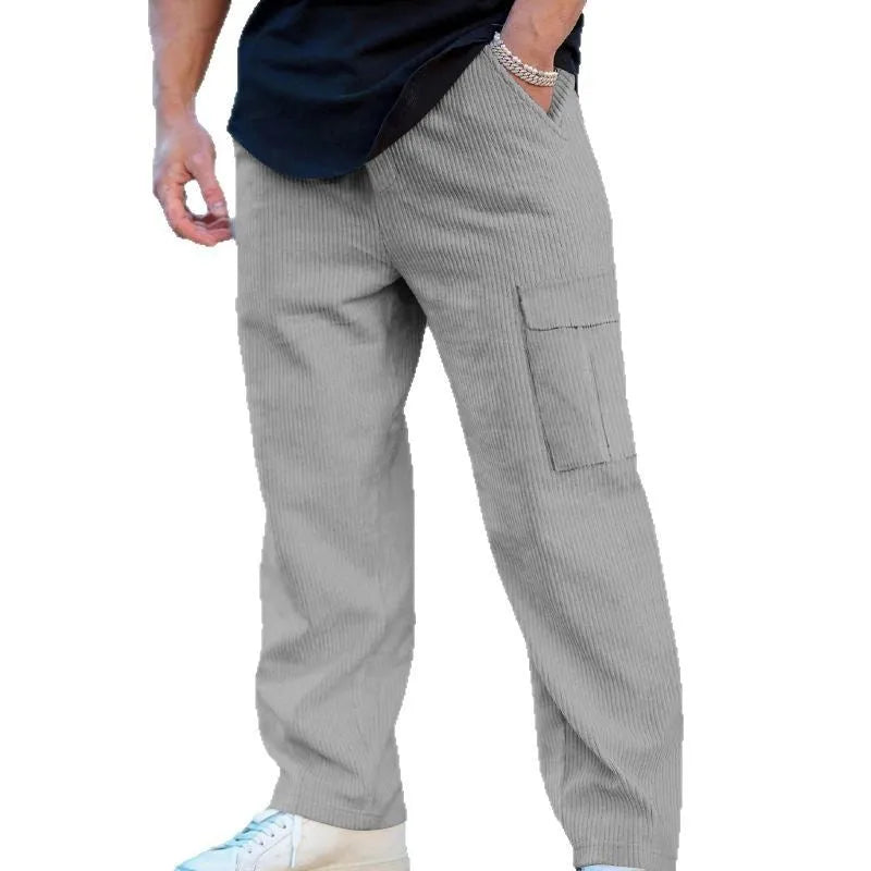 Men's loose-fitting corduroy cargo trousers in a straight-leg design with a drawstring waist.