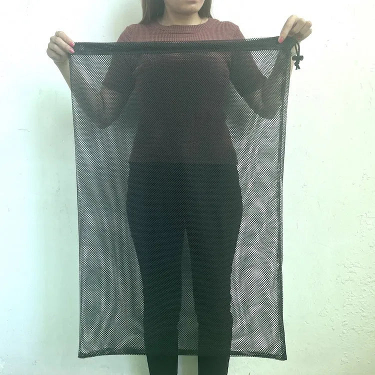 Black drawstring mesh storage bag for children's water ball toys and outdoor play equipment.