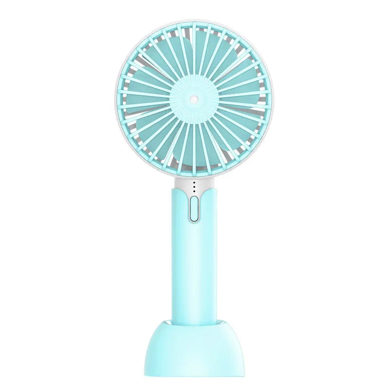 Blue handheld mini USB electric desk fan with oscillating head on a desktop