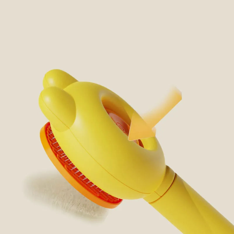 Self-cleaning pet grooming brush with coloured handle and stainless steel comb teeth with rubber tips