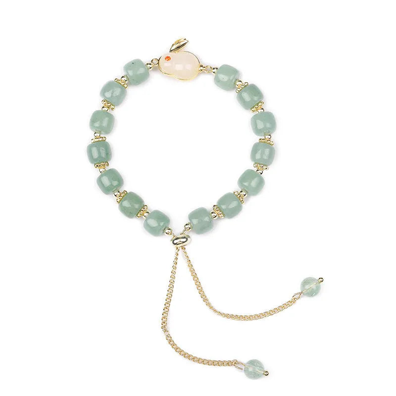 Rabbit charm bracelet with green aventurine or strawberry quartz stones on gold-plated chain