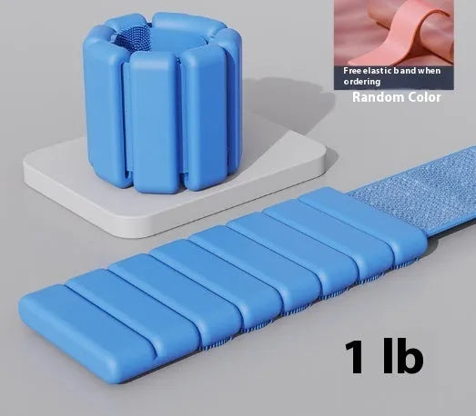 Velcro silicone fitness bracelet with detachable weight in black, blue, gray, or pink.