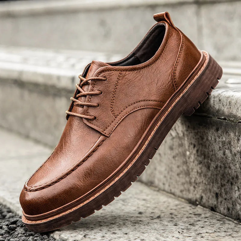 Men's black casual leather shoes with round toe, low-top design and decorative sewing lines