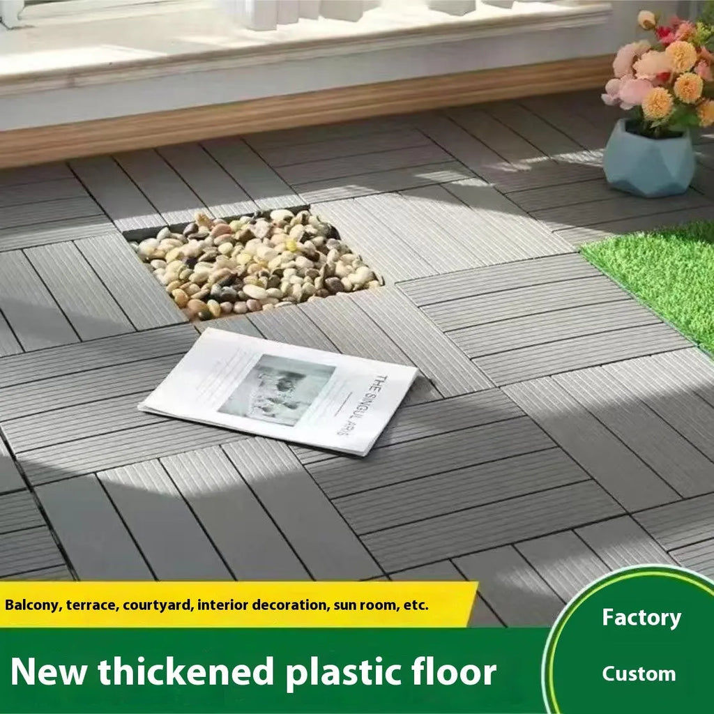 Ten square plastic floor tiles with wood grain finish shown interlocked on a floor.