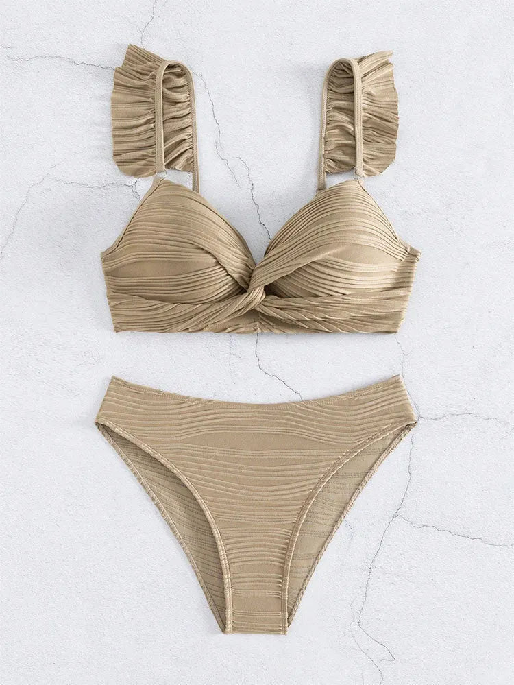 Women's solid colour bikini swimsuit in black laid flat, showing top and bottom pieces.