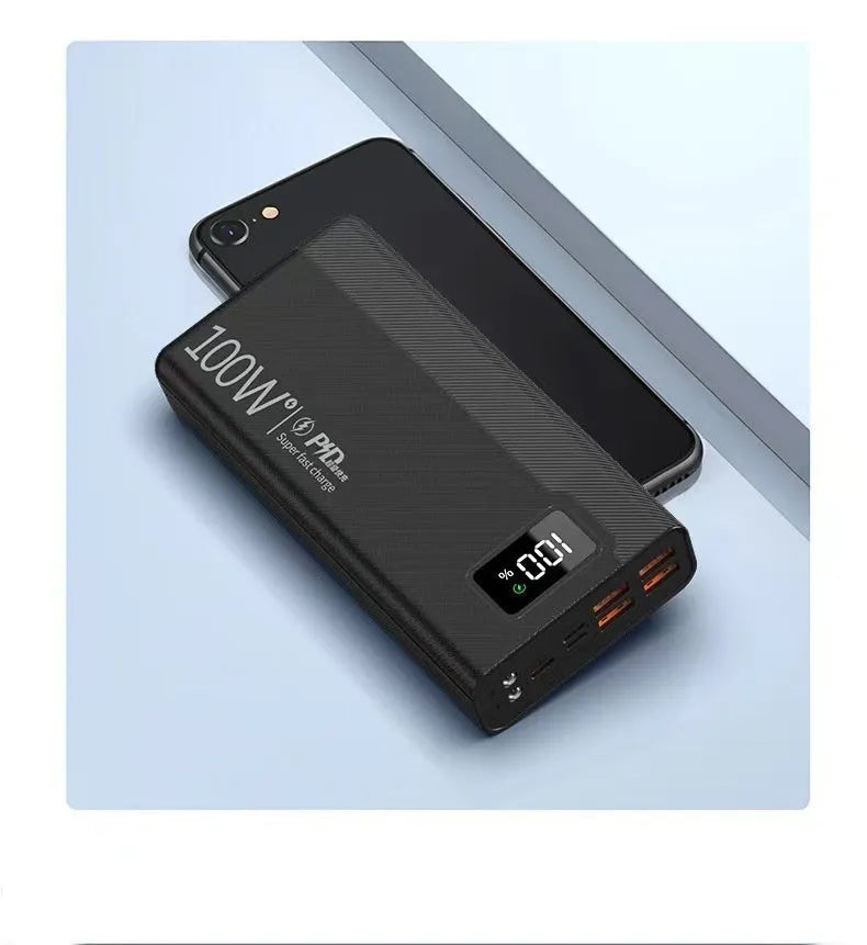 Large capacity power bank in black plastic shell showing compact rectangular design with charging ports