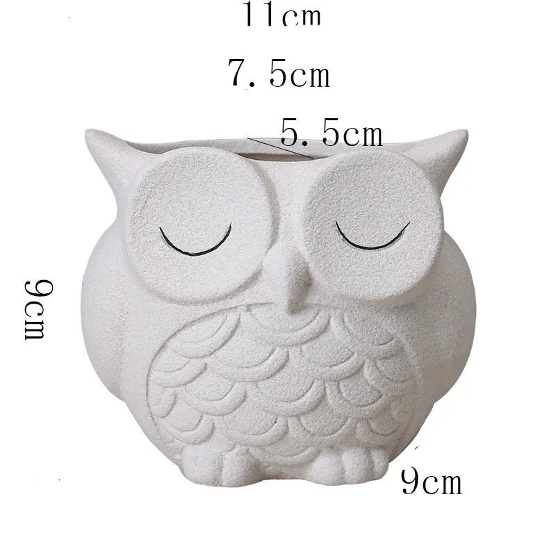Handmade frosted ceramic flower pot with cartoon owl design for succulents.