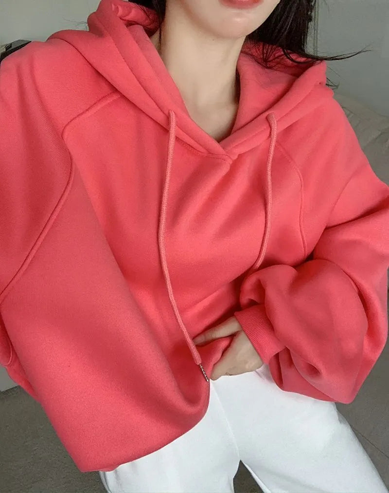 Watermelon red women's loose hooded pullover sweater made from mulberry silk fabric.