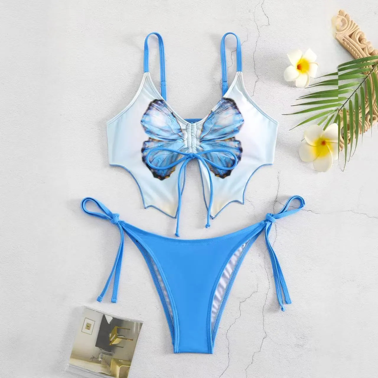 Women's purple bikini suit with bow detail and high-waisted briefs for swimming.