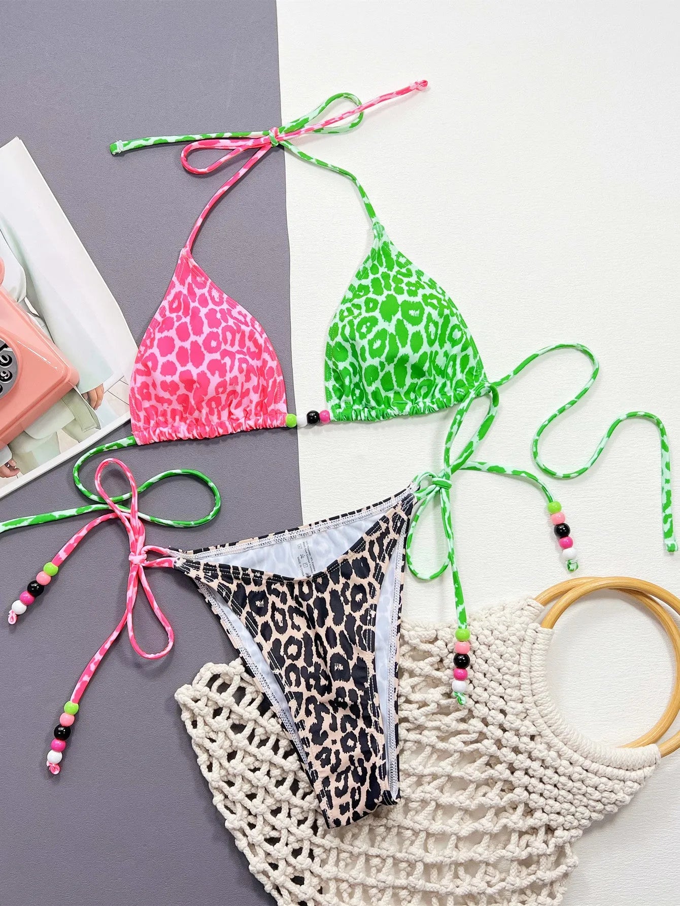 Women's leopard print bikini swimsuit with split briefs style showing bra and panties components