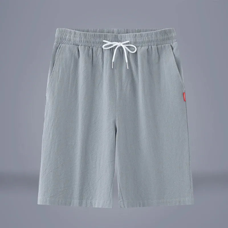 Cotton linen cropped summer trousers in a solid colour with a drawstring waist, shown in a casual Chinese-style fit.