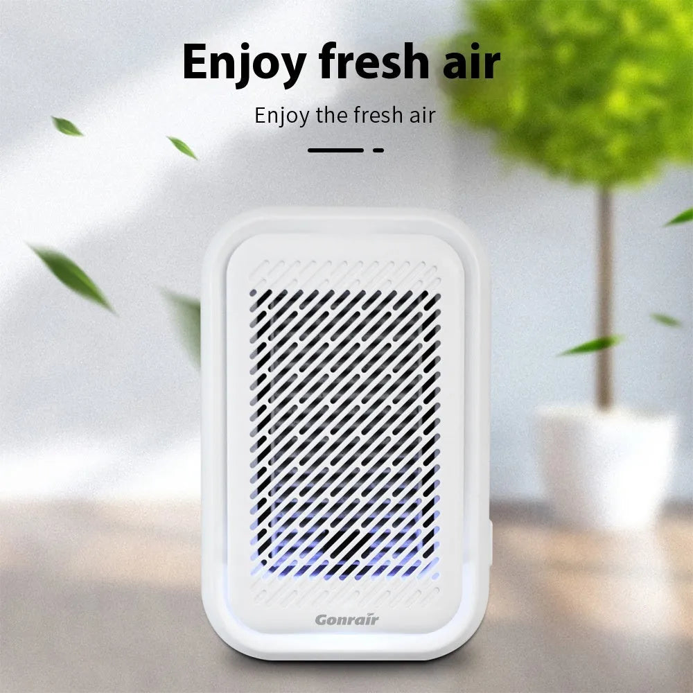 White wall-mounted air purifier unit with filter screen for rooms up to 10 square metres