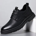 Men's black and brown leather casual shoes with a cowhide upper and rubber sole.