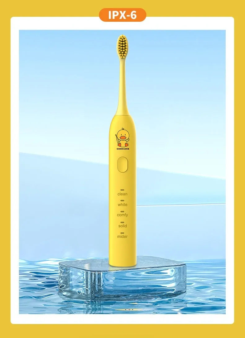 Small yellow duck USB rechargeable electric toothbrush with soft bristles and laser engraved shell