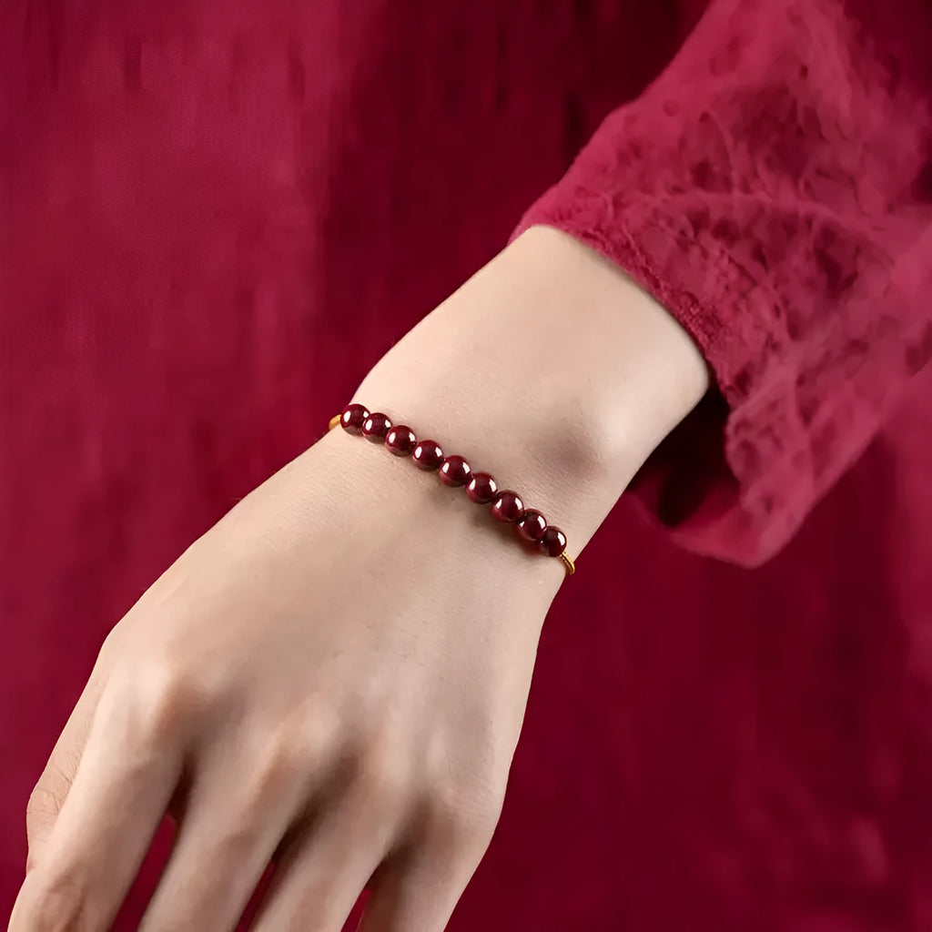 Hand-woven geometric bracelet made from raw cinnabar and Hetian jade beads