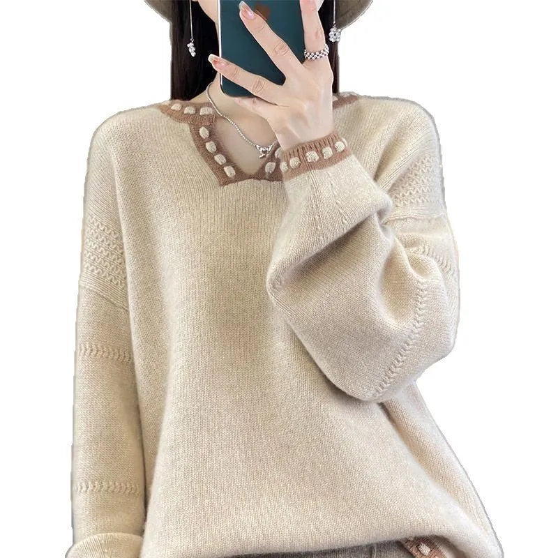 Women's camel coloured V-neck pullover sweater with long sleeves, made from viscose fibre.