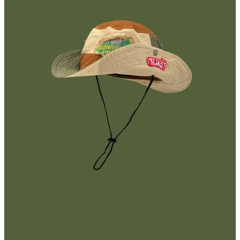Army green cotton foldable fisherman hat with patchwork details and flat top crown
