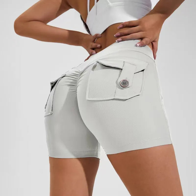 Women's high waist hip lifting shorts with pockets in various colours for fitness activities