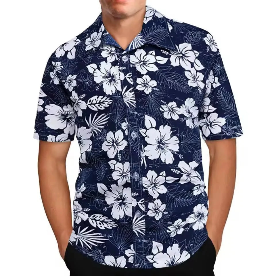 Man wearing a loose-fitting short sleeve shirt with a colourful floral pattern, cardigan style.