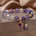 Close-up of a women's bracelet with natural purple amethyst stones set using micro inlay craftsmanship.