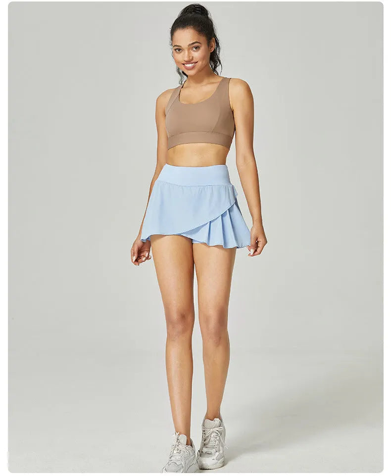 Women's solid colour quick-dry nylon sports shorts with stretch lining on a mannequin.