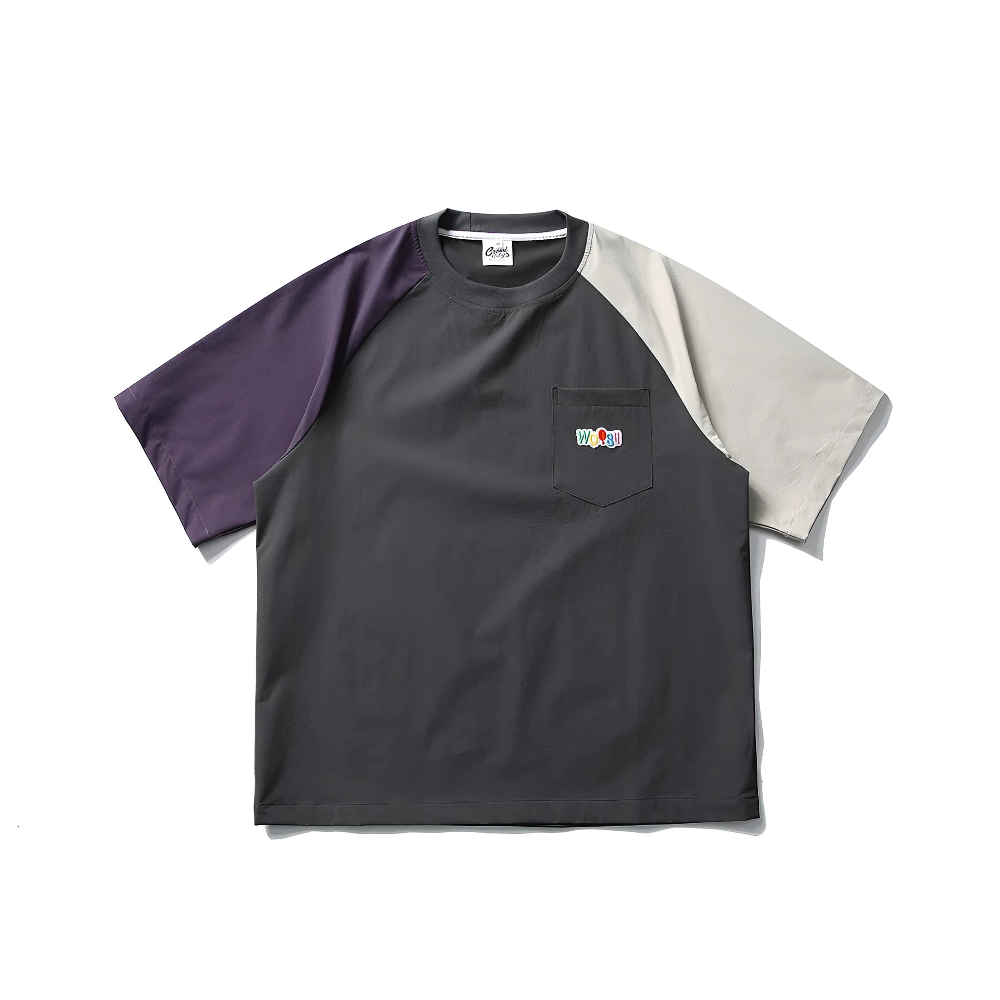 Dark grey loose fit quick-dry t-shirt with contrast raglan sleeves on a hanger.