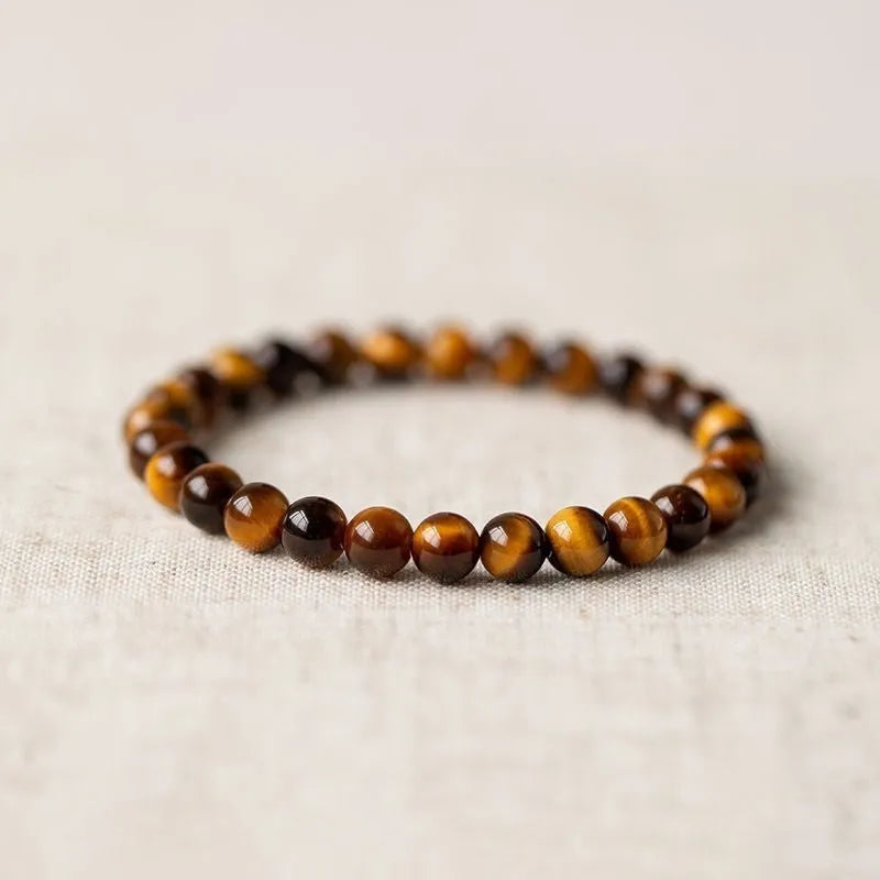 Ethnic style single circle beaded Buddha rosary bracelet shown in different bead sizes on a wrist.