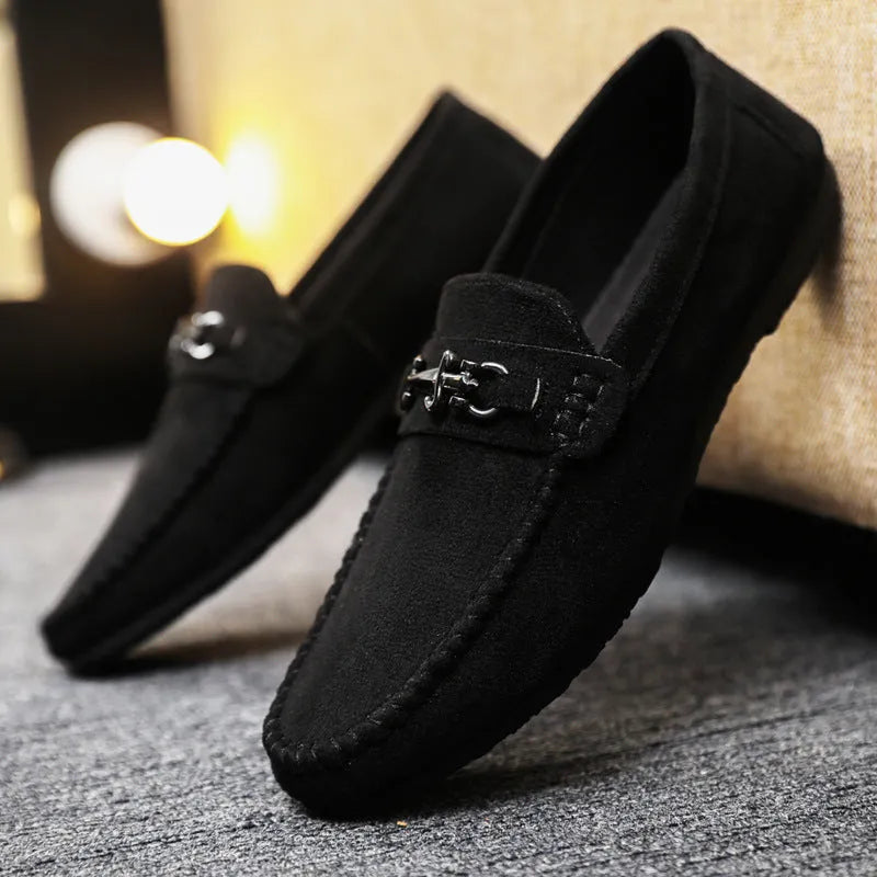 Men's waterproof slip-on loafers in artificial PU leather with rubber soles, available in black and brown colours
