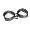 Black adjustable adult toy strap made from knitted belt material for intimate use