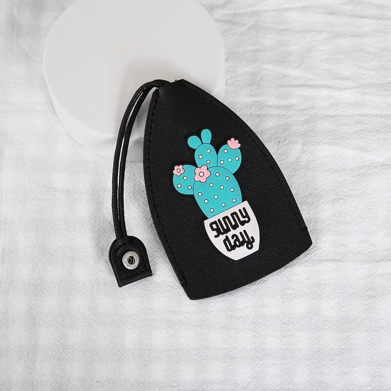 Colourful cartoon pull-out key case made from PU leather measuring approximately 14cm by 7.5cm