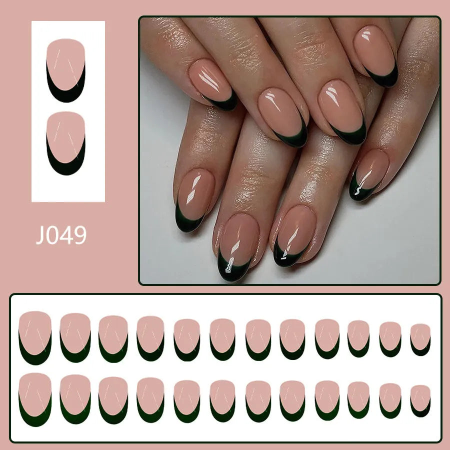 Black French tip false nails in short almond shape, 24 piece set on a white background.