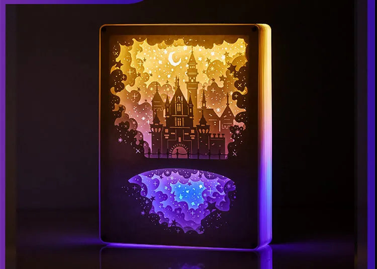 Modern 3D carved USB night light with remote control on a bedside table.