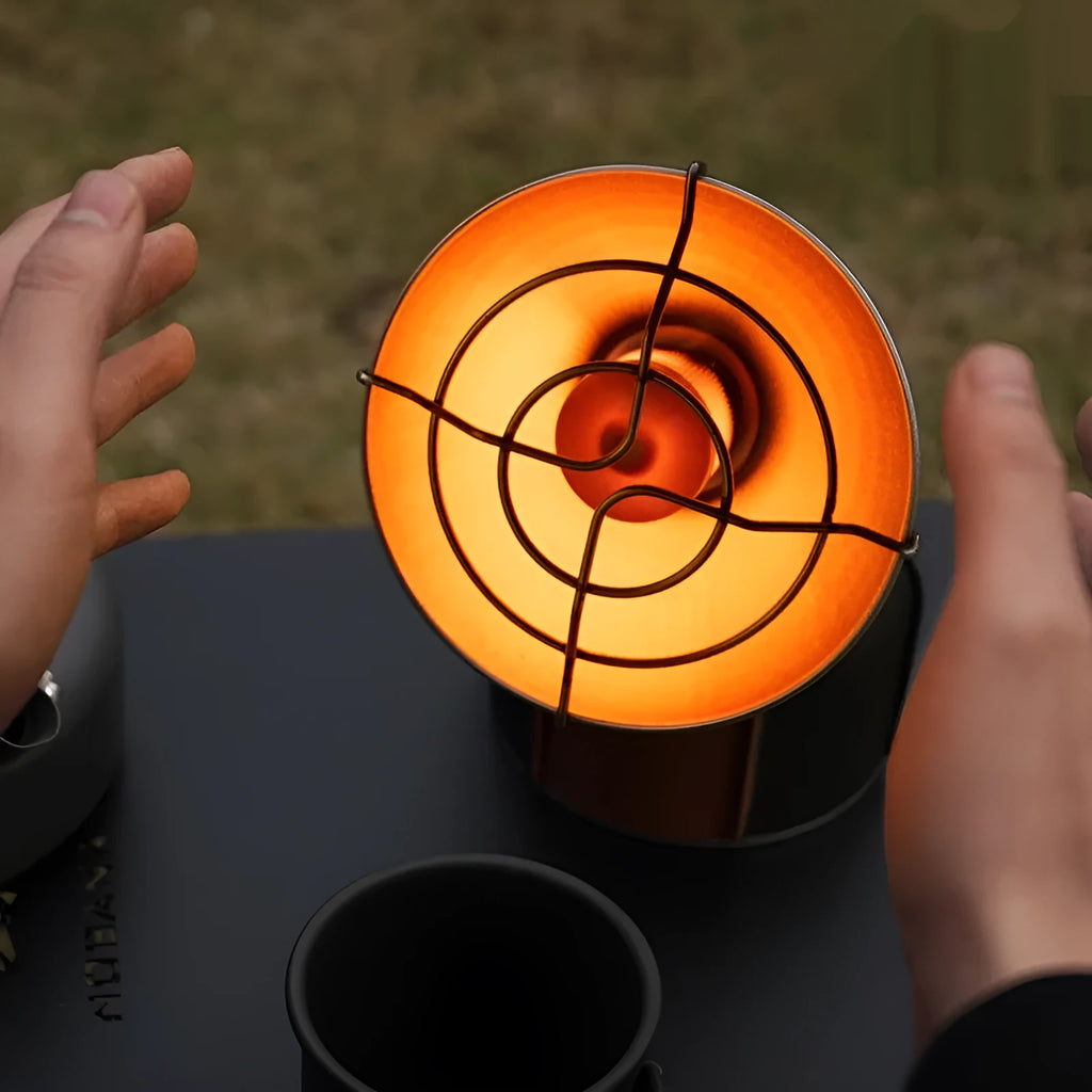 Black and orange portable camping heater with automatic ignition system