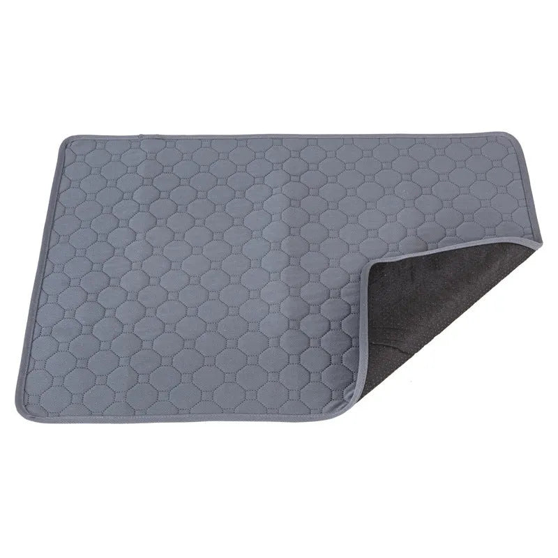 Grey and tan washable dog pee pads showing waterproof backing and size options