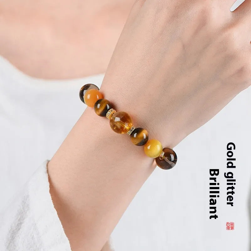 Natural yellow 10mm artificial crystal bead bracelet with tower string design on wrist