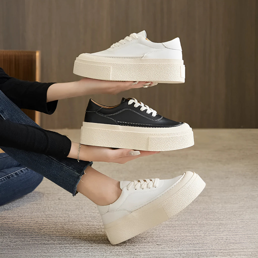Women's black platform casual board shoes with embossed cowhide leather and round toe