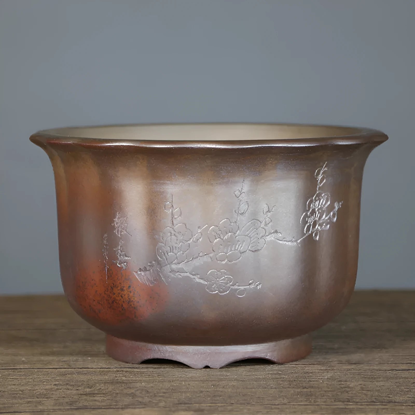 Indoor ceramic flower pot with wood burning antique carved design in purple sand clay