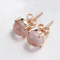 Women's rose gold drop shape stud earrings with synthetic ross quartz detailing and Korean style design