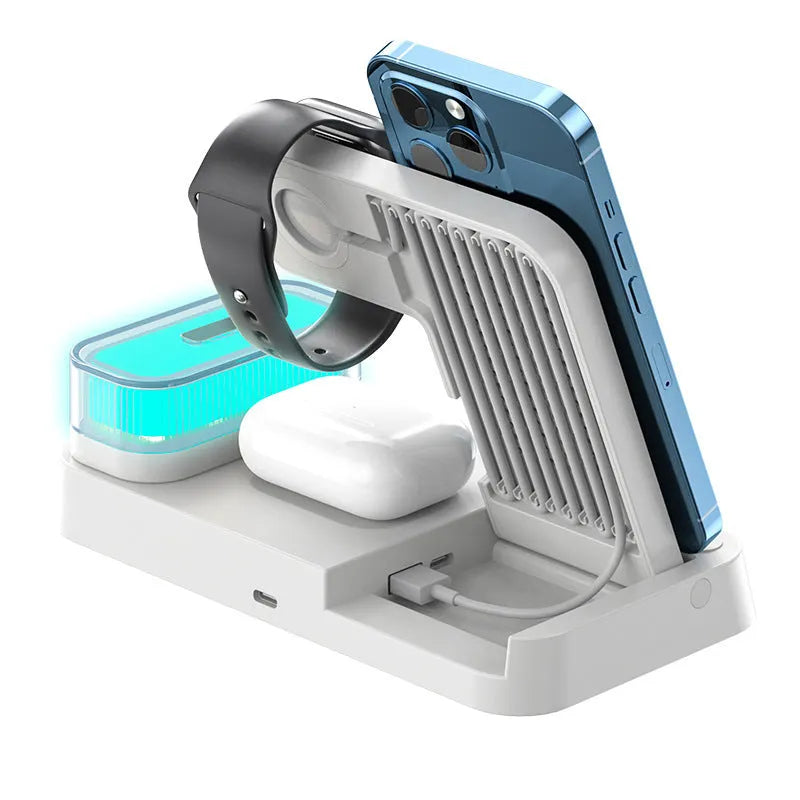 White 4-in-1 wireless charging station with foldable phone stand, LED clock display, and Apple Watch cable.