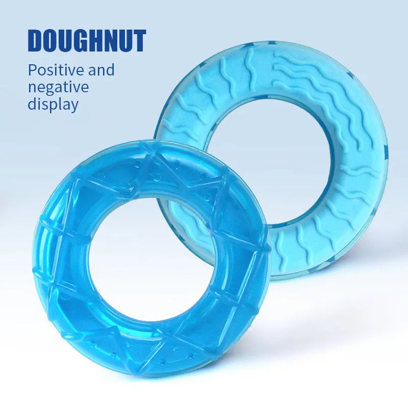 Three water-filled dog toys: a blue pacifier, a multicoloured popsicle, and an orange ring for freezing and chewing.